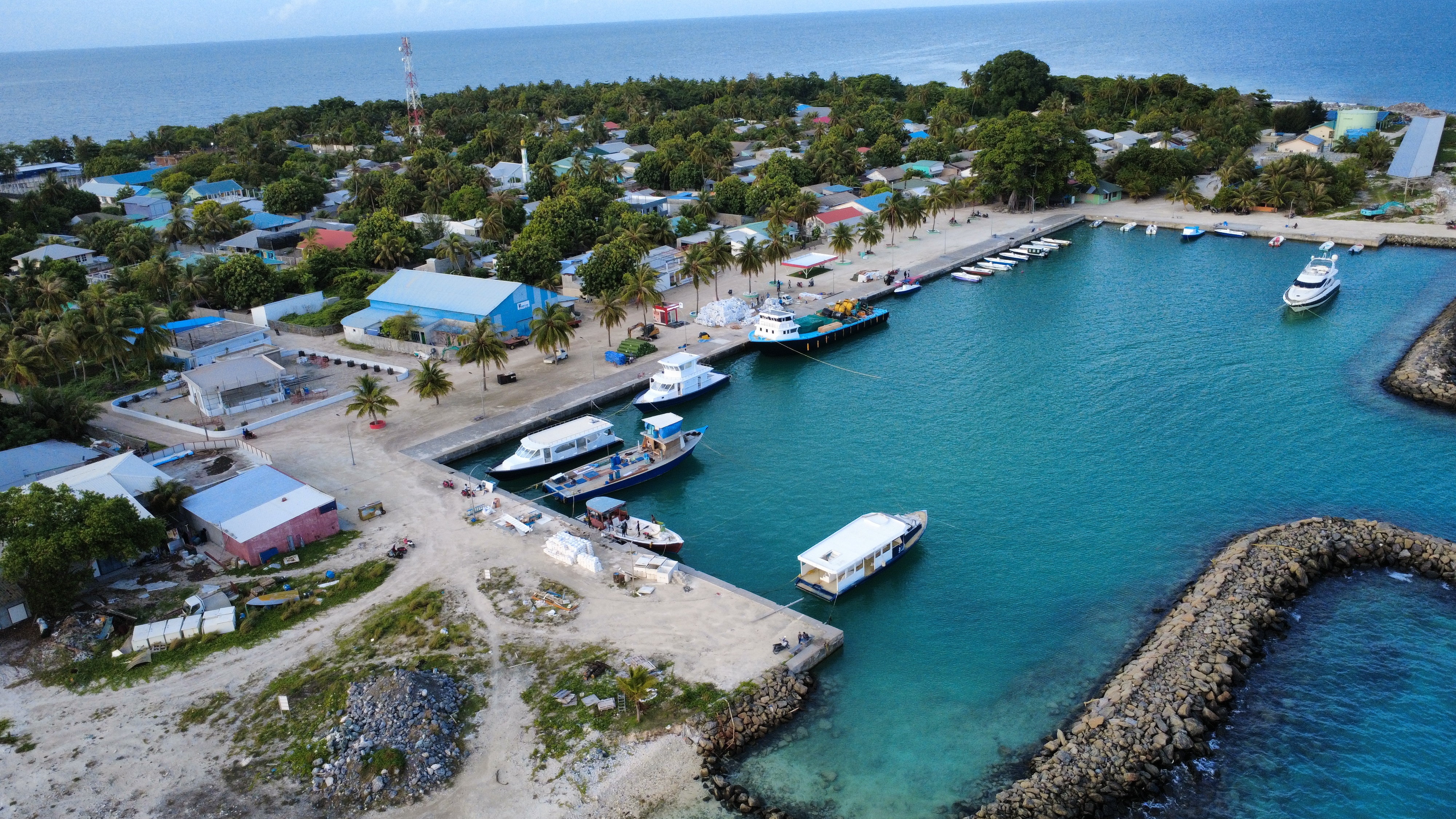 Aerial perspective of Innamaadhoo settlement and coastline